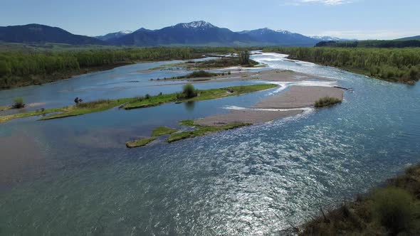 Flying view looking up stream of the Snake River