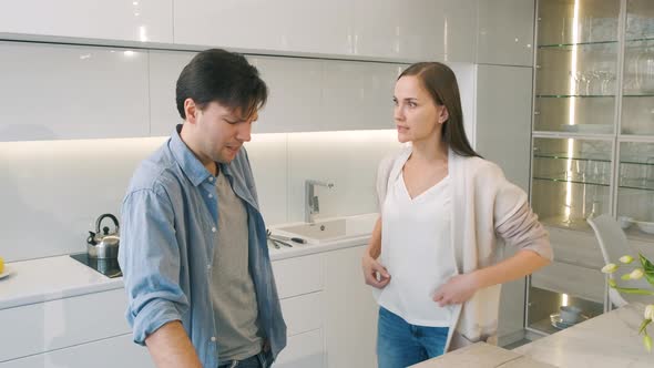 Couple Quarreling in the Kitchen