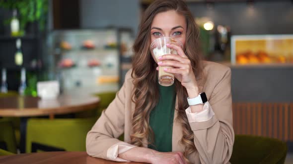 Business Woman Restaurant Owner Dressed Elegant Pantsuit Sitting Table In Restaurant With Bar