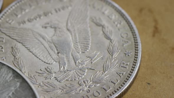 Rotating stock footage shot of antique American coins