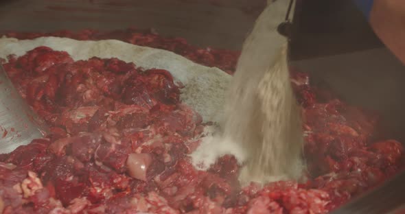 In A Large Centrifuge, Marinate The Meat With Chicken And Spices. Production Of Sausages