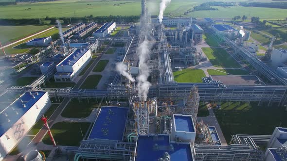 Chemical Plant Produces Gasoline and Mineral Fertilisers. Aerial Flying Centrally Morning Sunshine