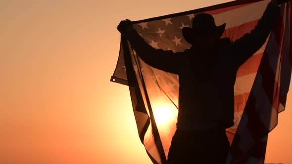 American Cowboy with USA National Flag in Slow Motion