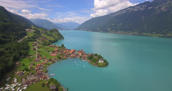 Aerial travel drone view of Iseltwald, Lake Brienz, Switzerland.