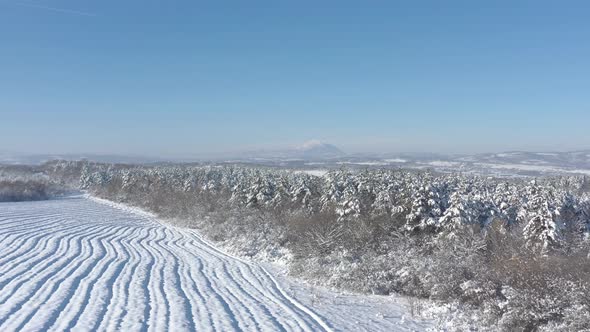 Mountain Rtanj under snow in Eastern Serbia 4K aerial video