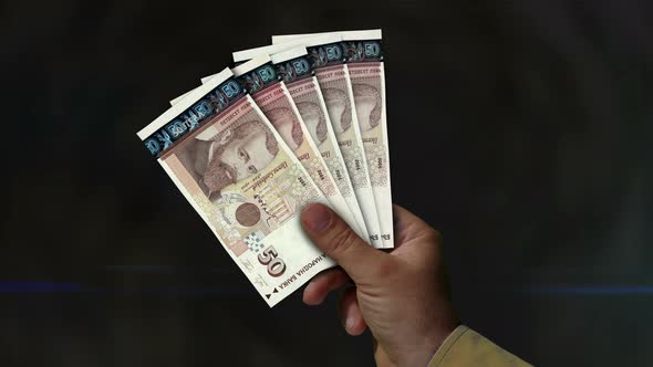 Bulgaria Leva money fan of banknotes in hand