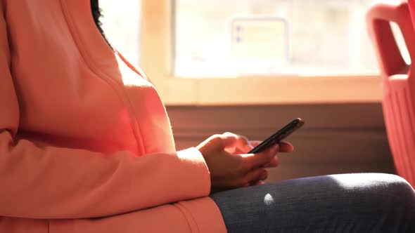 Young woman commuting on a bus