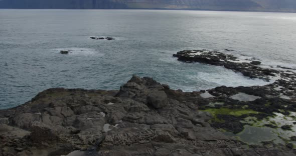 Wide Pan Right of the Coast in Gjogv, Faroe Islands