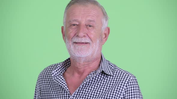 Face of Happy Senior Bearded Man Smiling