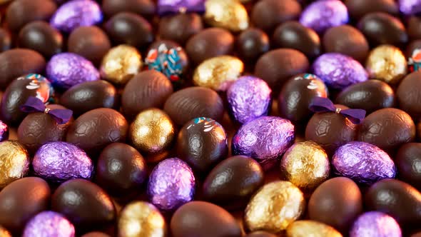 Adorable set of assorted chocolate Easter eggs. Shiny and colourful candies.