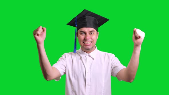 Young Male Smiling Graduate College in Black Graduating Hat