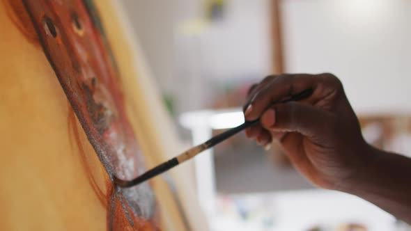 Close up of male artist painting on canvas at art studio / Videohive, Stock footage, People