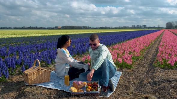 Couple Man and Woman in Flower Field Tulip Field in The Netherlands Colorful Tulip Fields in