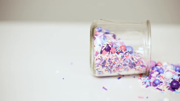 Colorful purple sprinkle blend on a white background.