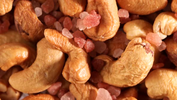 Video of cashews nut and Himalayan pink salt rotates slowly