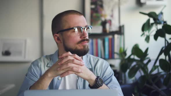 Business Man Thinking About His Future Plans at Workplace