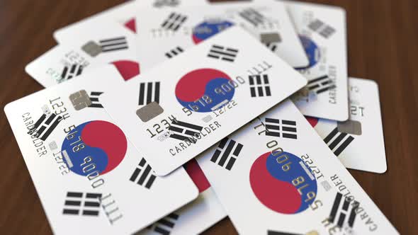 Pile of Credit Cards with Flag of South Korea alt