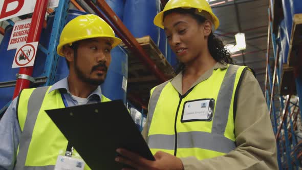 Workers interacting in a warehouse