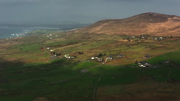 Loher Ringfort, Kerry, Ireland, March 2022. Drone orbits the ancient monument from the southwest as