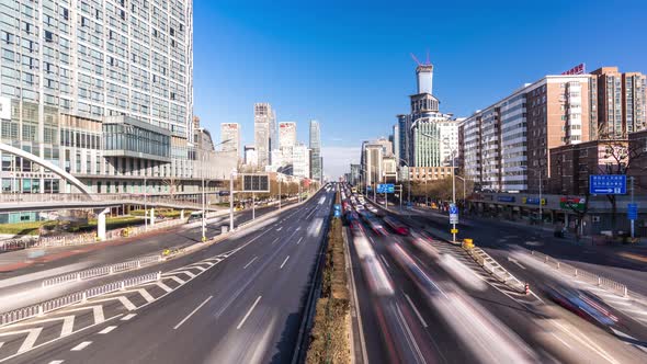 Timelapse of busy traffic road with modern office building in beijing china