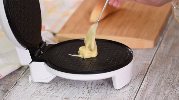 Making Fresh Hot Waffles in the Waffle Maker for Food. Preparation of Wafers From Fresh Dough