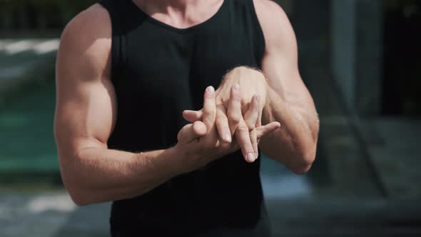 Close Up Fitness Sporty Man Warmsup Hands and Wrists