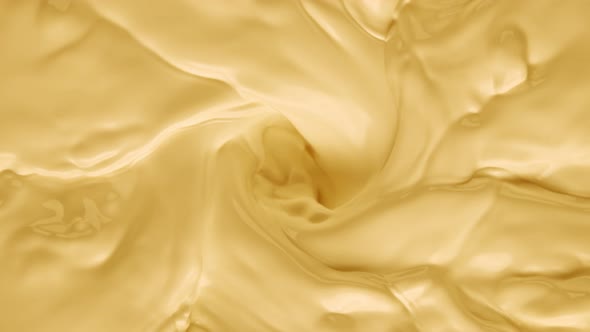 Super Slow Motion Shot of Swirling Yellow Milky Wortex at 1000Fps