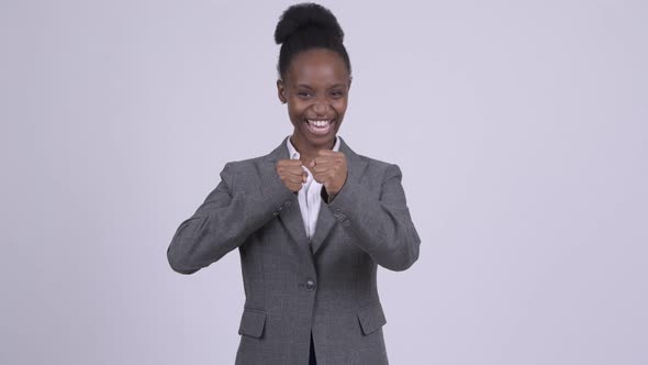 Young Happy African Businesswoman Showing Fighting Stance