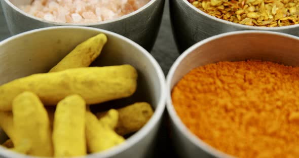 Various type spices in bowl 4k