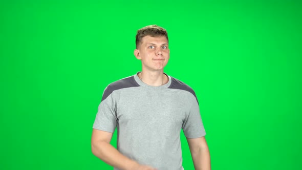 Young Man with Blue Eyes Goes Then Starts To Run, Chroma Key