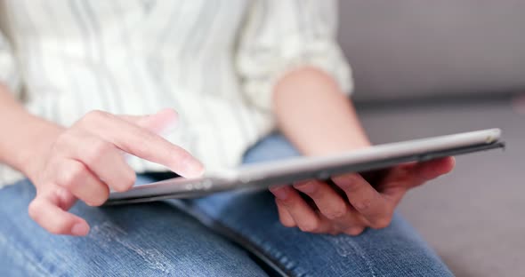 Woman working on tablet computer