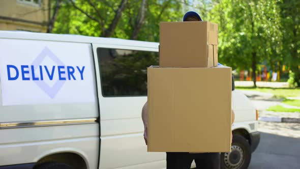Delivery Workman Holding Many Cardboard Boxes, Express Parcel Shipment Service