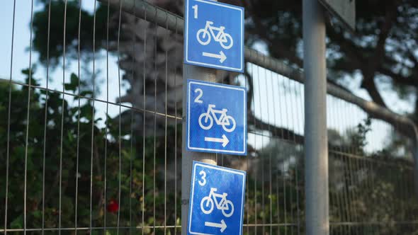 Bike Lane Road Signs Hanging Outdoors Closeup