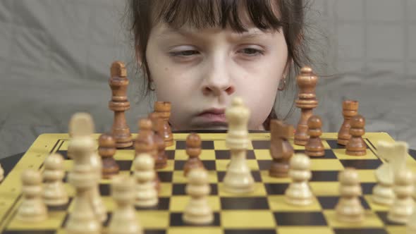 Smart child chess player alone. 