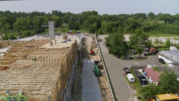 Construction Site by a Park Aerial Panning Shot