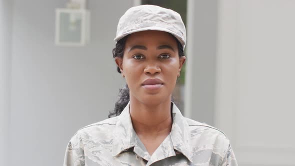 Animation of african american female soldier looking at camera