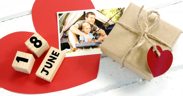 Wooden cubes with date 18 June and gifts 4k