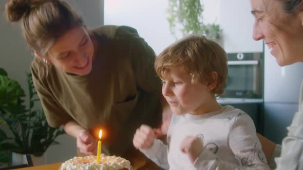 Happy LGBTQ Family Celebrating Kids Birthday at Home
