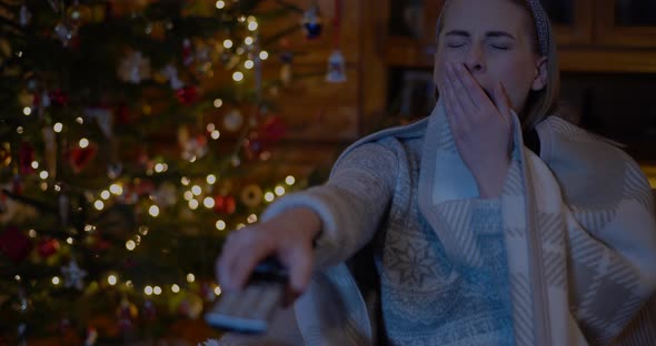 Woman Watching TV at Home