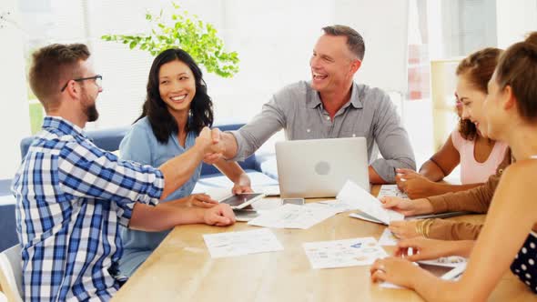 Business Colleagues Shaking Hands