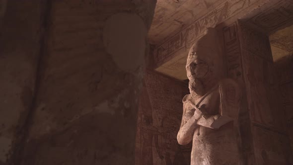 Shot of a big statue of Osiris in the interior of Abu Simbel.