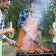 Happy Friends Having a Barbecue Party in Nature - VideoHive Item for Sale