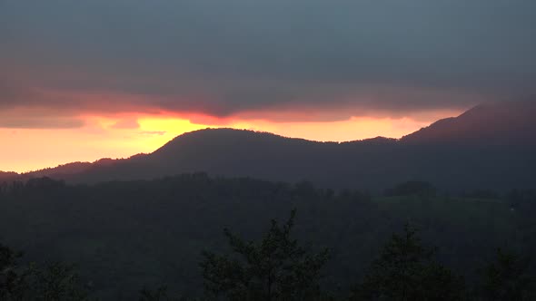 Mystical Emotional Sunrise in Forested Hills