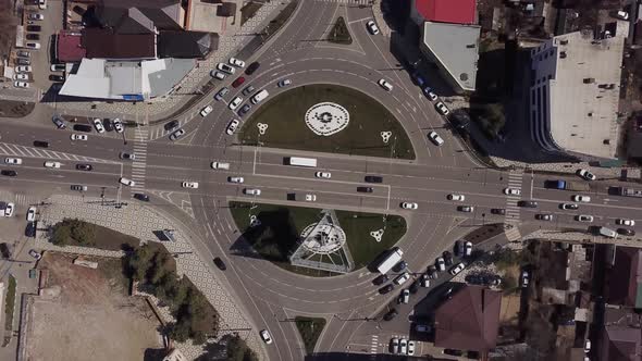 Zoom in Urban Road with Traffic Cars View of Roundabout