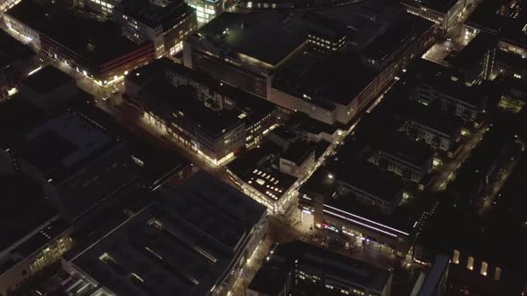 AERIAL: Slow Shot of City at Night, Cologne, Germany 