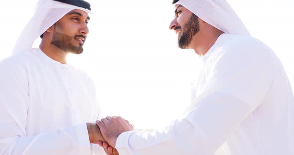 Men with traditional outfit  in the desert