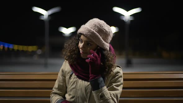 Funny Multiethnic Girl in Wonderful Mood, Calling Her Friend to Share Good News