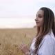 Romantic and Carefree Young Woman in Slow Motion Video Walking on Field Wheat Enjoying Freedom and - VideoHive Item for Sale