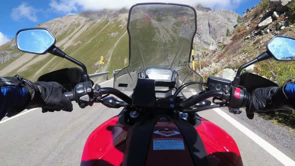 POV Biker Rides on Motorbike By Scenic Mountain Pass in Swiss Alps Moto Trip