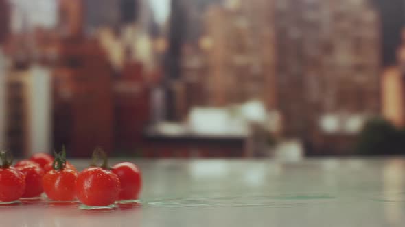 Food Footage of Fresh Natural Tomatoes on Table in Restaurant Over Colorful Blurry Background in